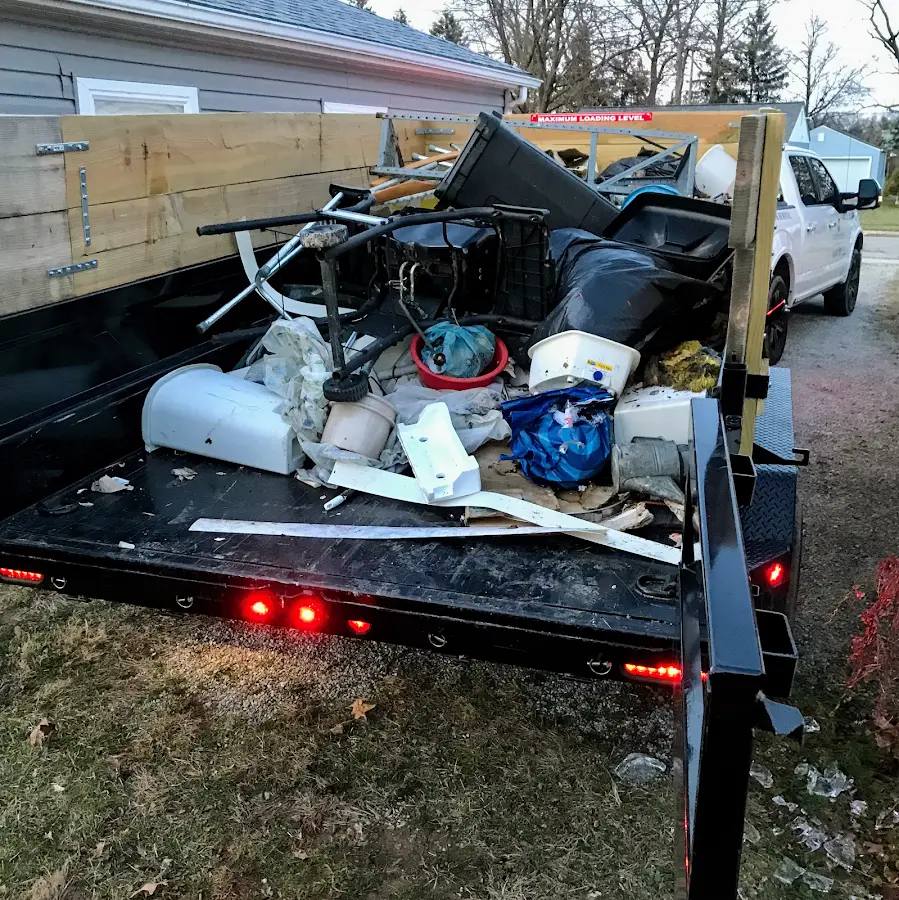 Roll-off dumpster delivered to a residential driveway in New Castle